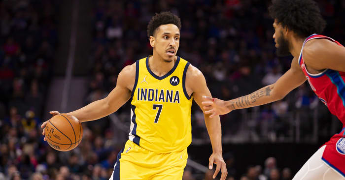 Indiana Pacers guard Malcolm Brogdon (7) gets defended by Detroit Pistons forward Marvin Bagley III (35) during the second quarter at Little Caesars Arena.
